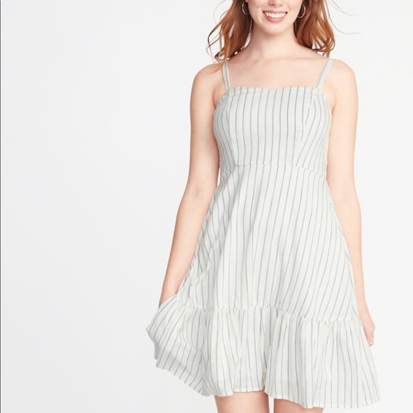 white dress with blue stripes